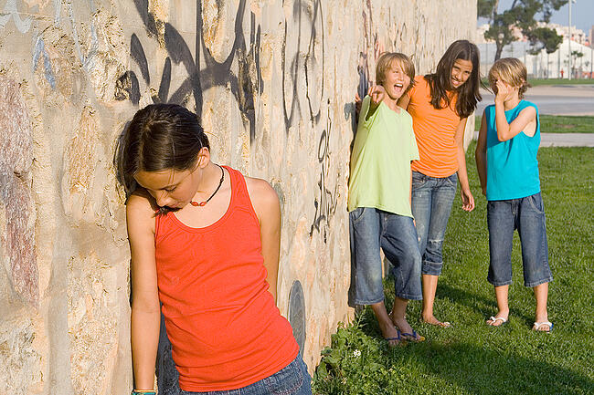 Girls bullying a classmate
