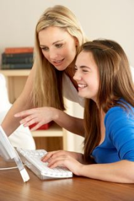 mother_helping_daughter_at_computer-resized-188