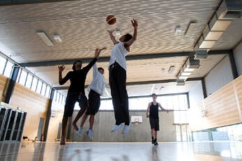 Ashs students playing basketball