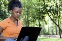 bigstock_-_student_under_trees-1